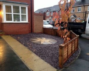 tarmac driveways in southampton with front garden design with stone and a central feature